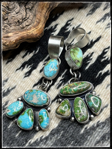 Betty Tom, Navajo silversmith. Sonoran Gold pendants in light blue and deepp green. 