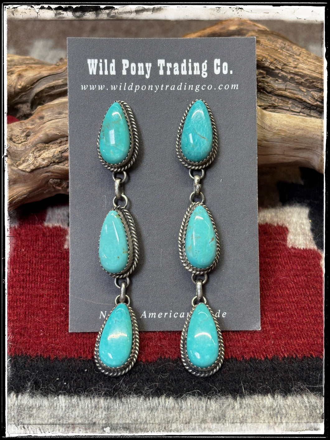 Freda Martinez, Navajo silversmith. Sterling silver and Kingman turquoise, triple drop earrings.  