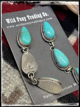 Load image into Gallery viewer, Freda Martinez, Navajo silversmith. Sterling silver and Kingman turquoise, triple drop earrings.   Hallmark stamp.  
