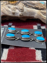Load image into Gallery viewer, Freda Martinez, Navajo silversmith. Sterling silver and Kingman turquoise triple oval drop earrings. 

