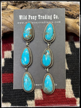 Load image into Gallery viewer, Virginia Becenti, Navajo silversmith. Sterling silver and Kingman turquoise triple teardrop earrings. 
