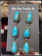 Load image into Gallery viewer, Virginia Becenti, Navajo silversmith. Sterling silver and Kingman turquoise triple teardrop earrings. 
