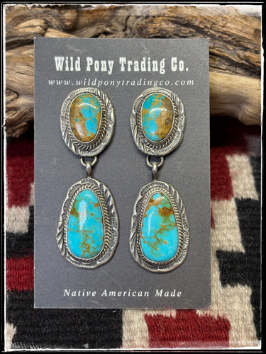 Freda Martinez, Navajo silversmith. Sterling silver and Kingman turquoise double drop earrings. 