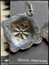 Load image into Gallery viewer, Jenny Blackgoat, Navajo silversmith  Sterling silver concho earrings.  Sterlimg stamp on back
