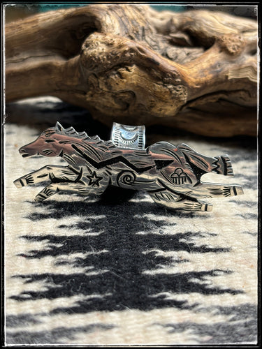 Richard Singer, Navajo silversmith. Sterling silver horse ring with overlay cutouts and symbols. Extra wide adjustable band.  