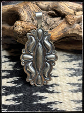Load image into Gallery viewer, Charles Johnson, Navajo silversmith.  Sterling silver, heavy bump out pendant 
