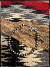 Load image into Gallery viewer, 5mm sterling silver, oxidized bead bracelet.
