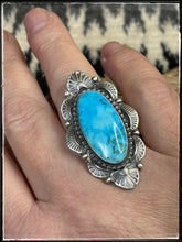 Load image into Gallery viewer, Justine Tso, Navajo silversmith.  Sterling silver and Kingman turquoise ring with wide band.
