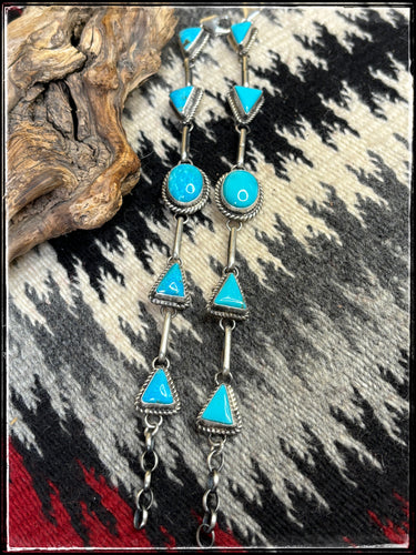 Judith Dixon, Navajo silversmith.  7 Stone link bracelet with Kingman turquoise. 