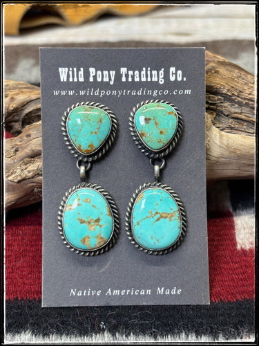 Freda Martinez, Navajo silversmith.  Sterling silver and light green Kingman turquoise earrings. 