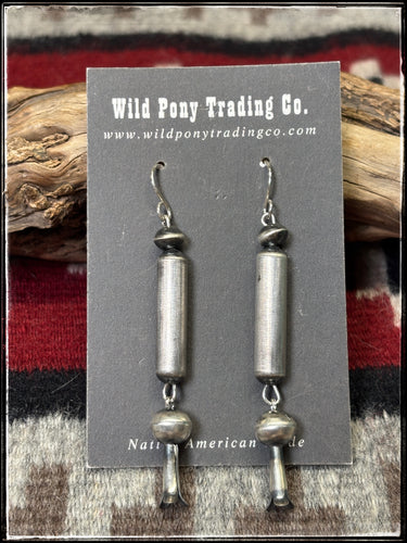 Sterling silver beads, handmade tube and blossom bead Handmade by Navajo silversmith Tonisha Haley. 