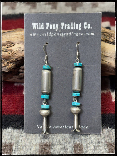 Sterling silver and turquoise disc beads, handmade tube and blossom bead Handmade by Navajo silversmith Tonisha Haley. 