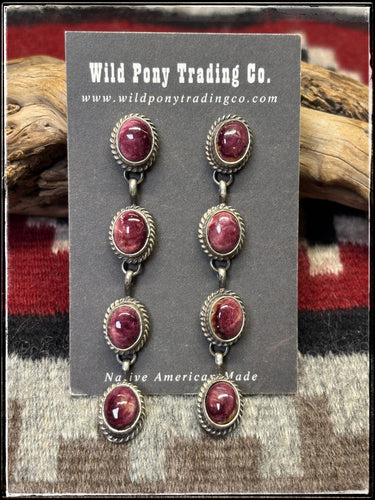 Freda Martinez, Navajo silversmith. Sterling silver and purple spiny shell quad drop earrings.  