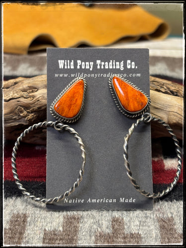 Elouise Kee, Navajo silversmith.  Sterling silver and orange spiny shell hoop earrings. 