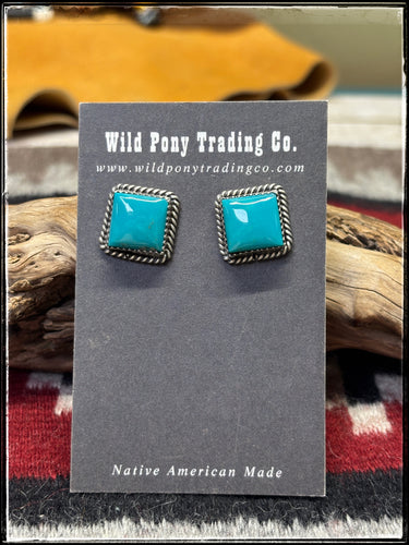 Freda Martinez, Navajo silversmith.  Sterling silver and Kingman turquoise square studs. 