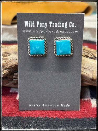 Freda Martinez, Navajo silversmith.  Sterling silver and Kingman turquoise square studs. 