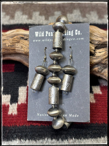 Sharon Cooley, Navajo silversmith.  Sterling silver bracelet and earring set. 