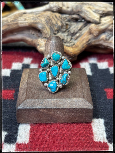 Priscilla Reeder, Navajo silversmith.  Sterling silver and Kingman turquoise cluster ring. size 8. 