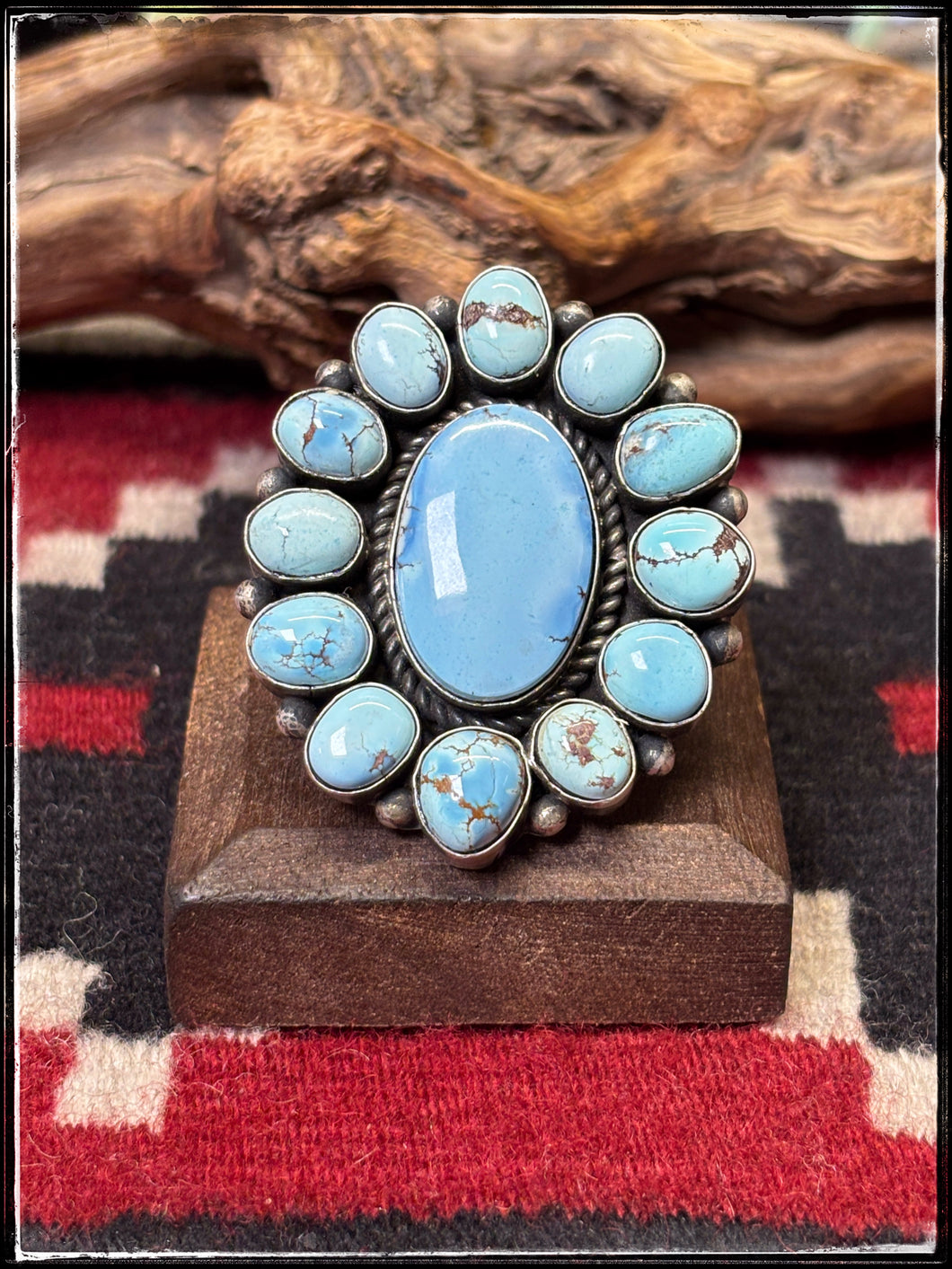 Pansy Johnson, Navajo silversmith.  Sterling silver and Golden Hills turquoise cluster ring with an adjustable band. 