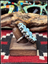 Load image into Gallery viewer, Pansy Johnson, Navajo silversmith.  Sterling silver and Golden Hills turquoise cluster ring with an adjustable band. 
