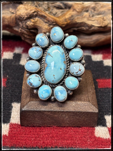Pansy Johnson Navajo silversmith.  Sterling silver and Golden Hills cluster ring with an adjustable band. 