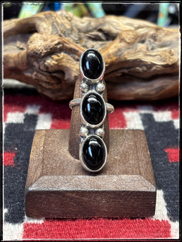 Jude Candelaria, Zuni artist.  Sterling silver and black onyx bar ring. 