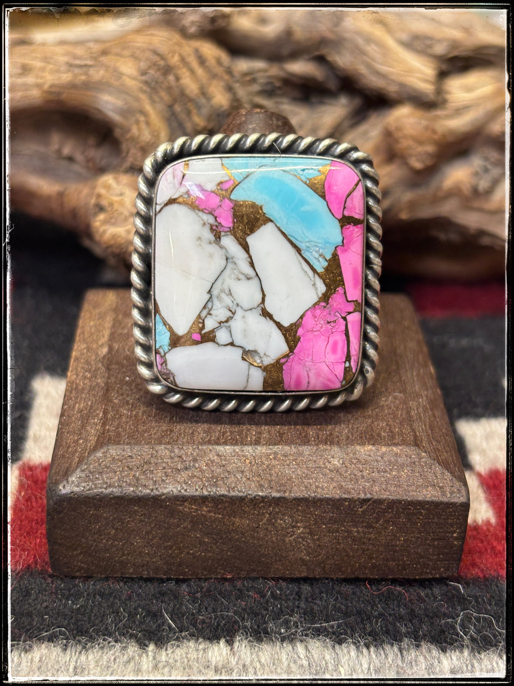 Augustine Largo, Navajo silversmith. Sterling silver and Cotton Candy  square rings. 