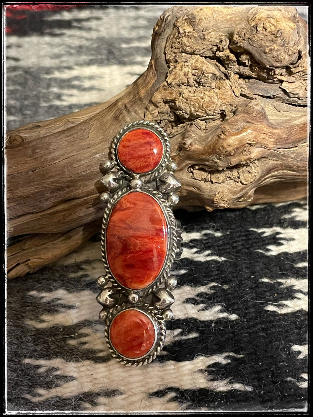 Del Arviso, sterling silver and orange spiny oyster shell ring. Navajo made.