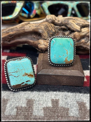 Augustine Largo, Navajo silversmith.  Sterling silver and Kingman turquoise square rings with an adjustable band.  