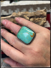 Load image into Gallery viewer, Augustine Largo, Navajo silversmith.  Sterling silver and Kingman turquoise square rings with an adjustable band.  
