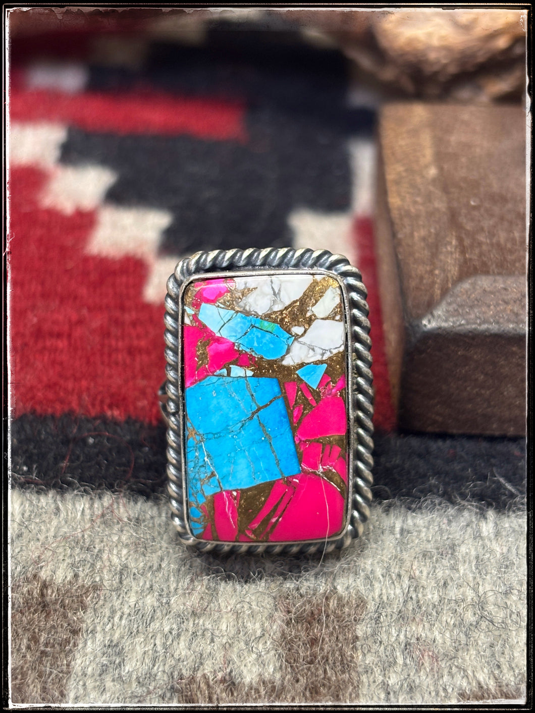 Mary Ann Spencer, Navajo silversmith.  Sterling silver and vibrant Cotton Candy (composite stone) rings. 
