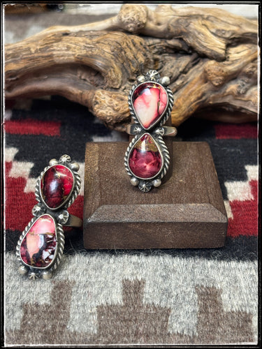 Eugene Belone, Navajo silversmith.  Sterling silver and Rose Dahlia composite stone rings. 