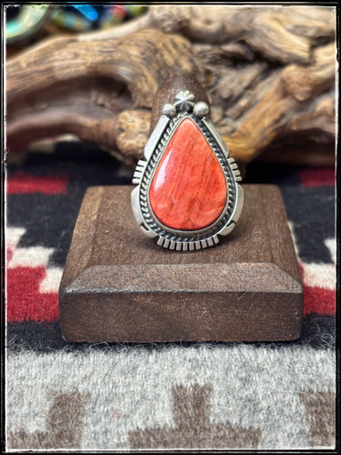 Alfred Martinez, Navajo silversmith. Orange spiny shell and sterling silver ring. Adjustable band. 