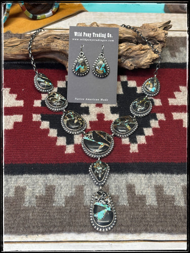Mary Ann Spencer, Navajo silversmith.  Sterling silver and Blackjack turquoise Y necklace set with earrings.  