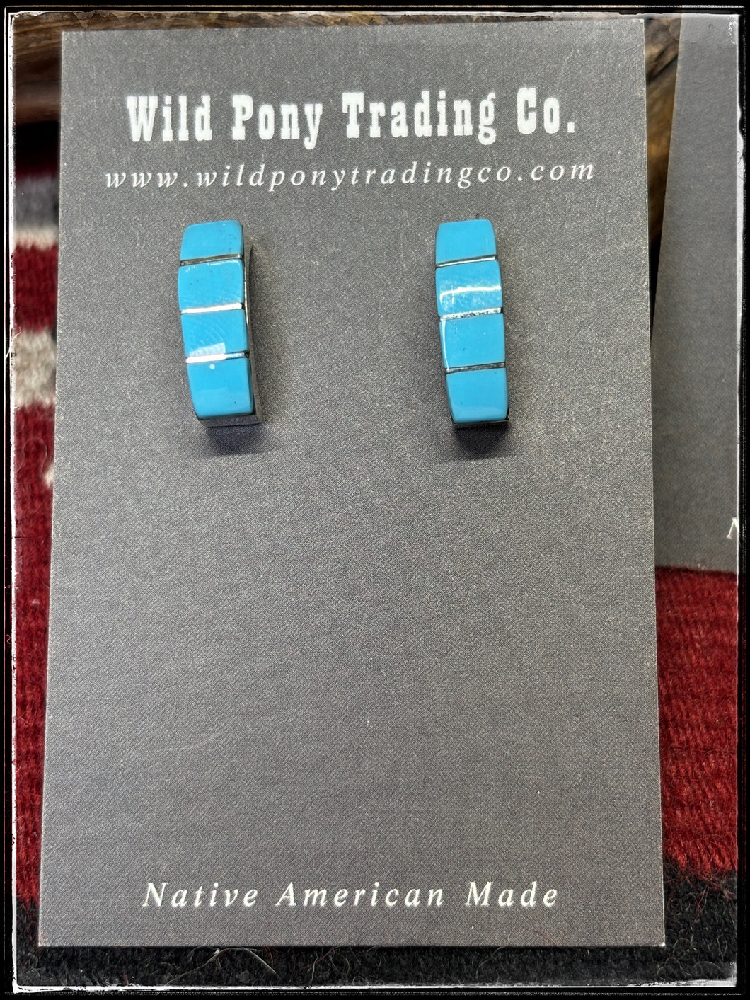 Gilbert Kanestra, Zuni artist.  Sterling silver and turquoise half hoops.  