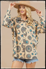 Load image into Gallery viewer, A long sleeve, button down blouse, covered in printed conchos, najas, and turquoise pieces. 
