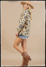 Load image into Gallery viewer, A long sleeve, button down blouse, covered in printed conchos, najas, and turquoise pieces. 
