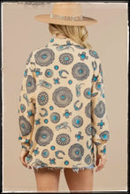 Load image into Gallery viewer, A long sleeve, button down blouse, covered in printed conchos, najas, and turquoise pieces. 
