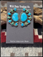 Load image into Gallery viewer, Geraldine James, Navajo silversmith.  Sterling silver and assorted Kingman stones set in a half cluster pattern. Pair B. 
