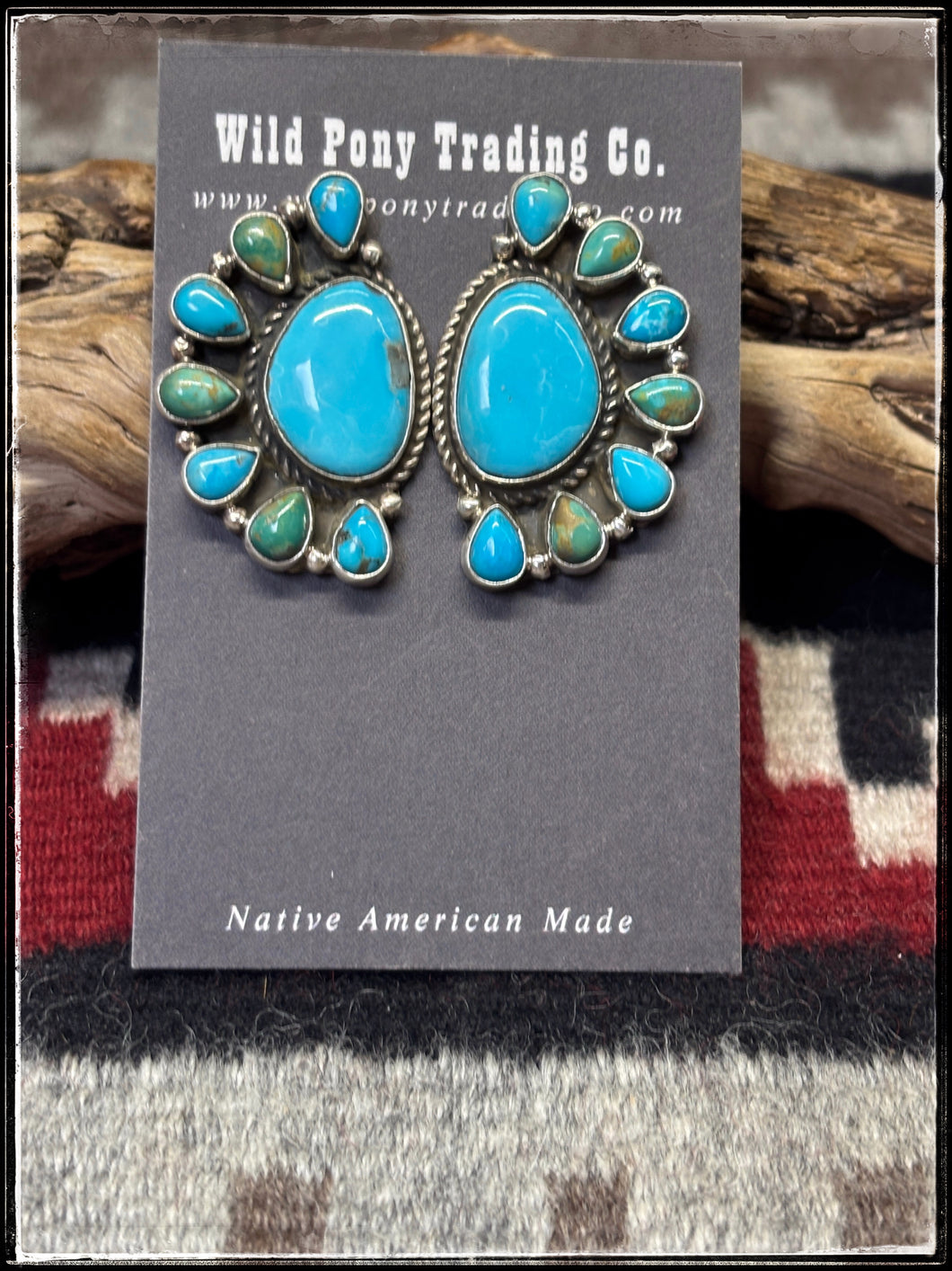 Geraldine James, Navajo silversmith.  Sterling silver and assorted Kingman stones set in a half cluster pattern. Pair B. 