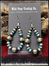 Load image into Gallery viewer, Sterling silver bench made beads along with machine blown beads and turquoise disc earrings. 
