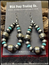 Load image into Gallery viewer, Sterling silver bench made beads along with machine blown beads and turquoise disc earrings. 
