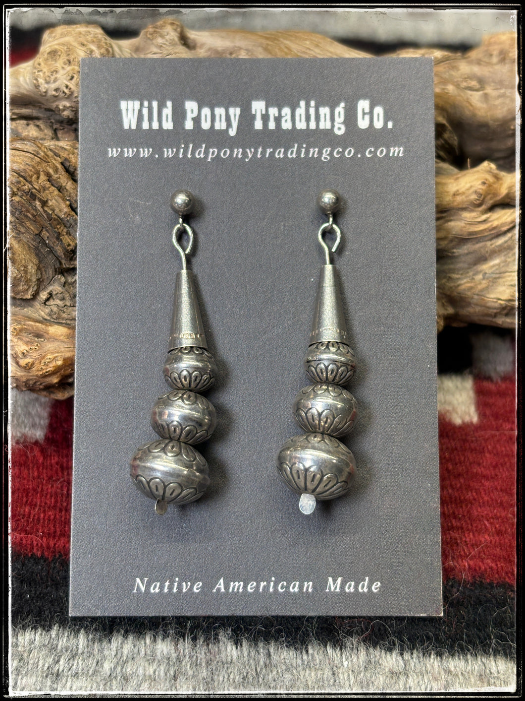 Sterling silver, machine blown beads with stampwork.  