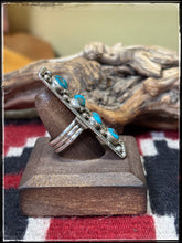 Load image into Gallery viewer, Priscilla Reeder Navajo silversmith. Sterling silver and 4 turquoise stone bar ring. 
