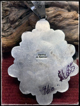 Load image into Gallery viewer, Annie Spencer, Navajo silversmith.  Sterling silver and mixed Sonoran turquoise pendant. Hallmark. 
