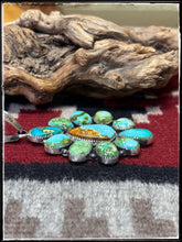 Load image into Gallery viewer, Annie Spencer, Navajo silversmith.  Sterling silver and mixed Sonoran turquoise pendant.

