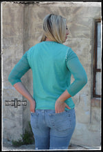 Load image into Gallery viewer, Long sleeve top studded around the neck and shoulders.  The long sleeves are sheer.
