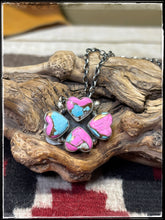 Load image into Gallery viewer, Conovan Skeets, Navajo silversmith.  Sterling silver and Cotton Candy (composite material) quad heart pendant.
