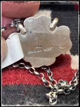 Load image into Gallery viewer, Conovan Skeets, Navajo silversmith.  Sterling silver and Cotton Candy (composite material) quad heart pendant.  Hallmark stamp. 
