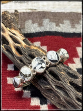 Load image into Gallery viewer, Priscilla Reeder, Navajo silversmith. Sterling silver and 5 white buffalo stone row bracelet. 
